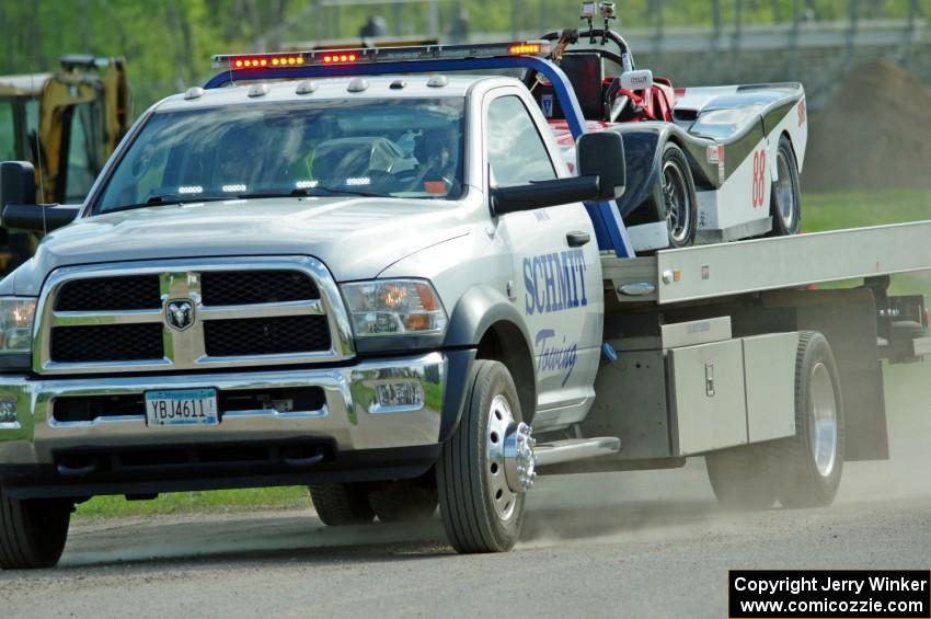 Craig Wheatley's Spec Racer Ford comes in on the flatbed.