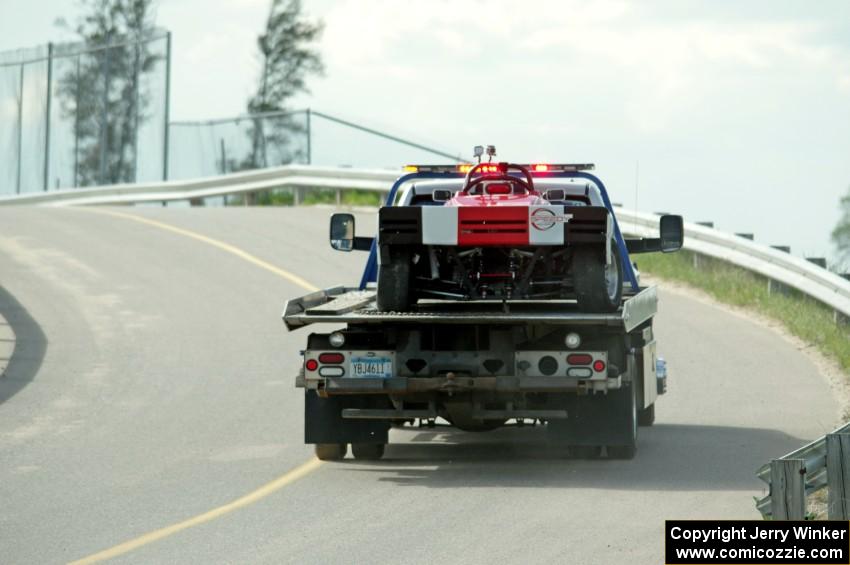 Craig Wheatley's Spec Racer Ford comes in on the flatbed.