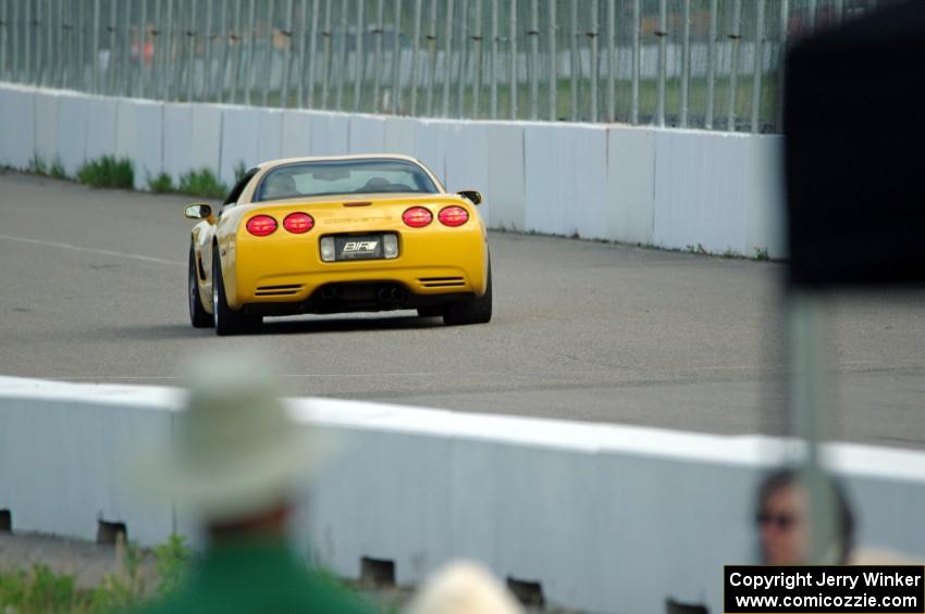 Bruce Parsons drives the Chevy Corvette pace car.