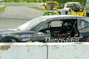 John Atwell pulls his Chevy Camaro off course at turn 12.