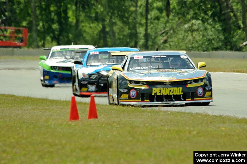 Lawrence Loshak's Chevy Camaro, Tony Buffomante's Ford Mustang and Gar Robinson's Chevy Camaro