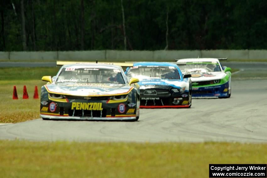 Lawrence Loshak's Chevy Camaro, Tony Buffomante's Ford Mustang and Gar Robinson's Chevy Camaro