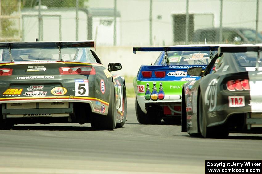 Gar Robinson's Chevy Camaro, Lawrence Loshak's Chevy Camaro and Justin Haley's Ford Mustang