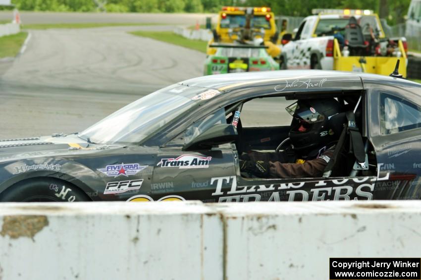 John Atwell pulls his Chevy Camaro off course at turn 12.