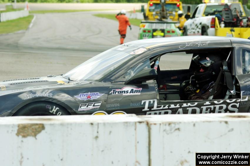 John Atwell pulls his Chevy Camaro off course at turn 12.