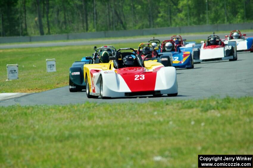 Dave Glodowski's Spec Racer Ford leads the pack into turn 4.