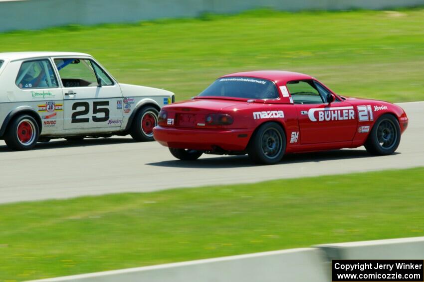 Andrew Jenkins' Spec Miata Mazda Miata and Jimmy Griggs' H Production VW Rabbit