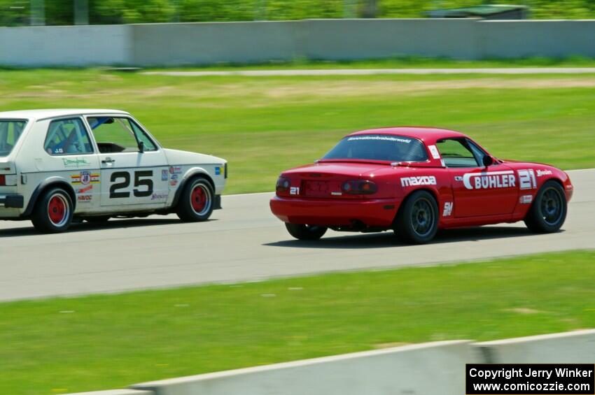 Andrew Jenkins' Spec Miata Mazda Miata and Jimmy Griggs' H Production VW Rabbit