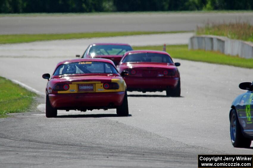 Andrew Jenkins' Spec Miata Mazda Miata and Greg Youngdahl's Spec Miata Mazda Miata