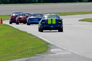 John Glowaski's STL Dodge Neon ACR chases Mike Smith's STL Honda Civic Si and Greg Youngdahl's and Rick Buan's Spec Miata Mazda 