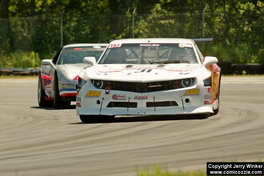 Mel Shaw's GT-2 Chevy Camaro and Darrell Peterson's T2 Chevy Corvette