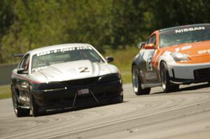 Tom Fuehrer's SPO Ford Mustang and James Berlin's T3 Nissan 350Z