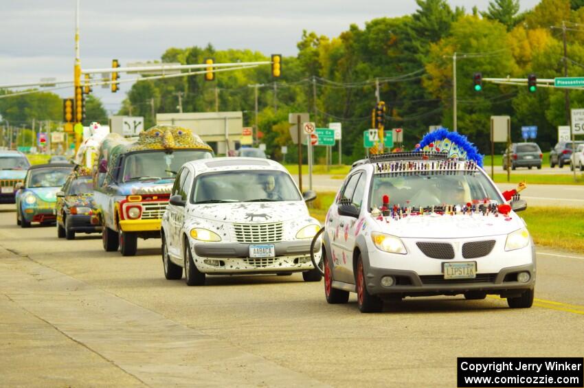 ArtCars parading to Blue Sun Soda