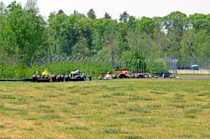 The formula car field streams out of turn six down to 7/8.