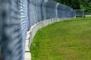 Catch-fencing and barriers between turns five and six.