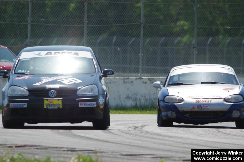 Tom Daly's T4 VW Rabbit and Philip Heald's Spec Miata Mazda Miata