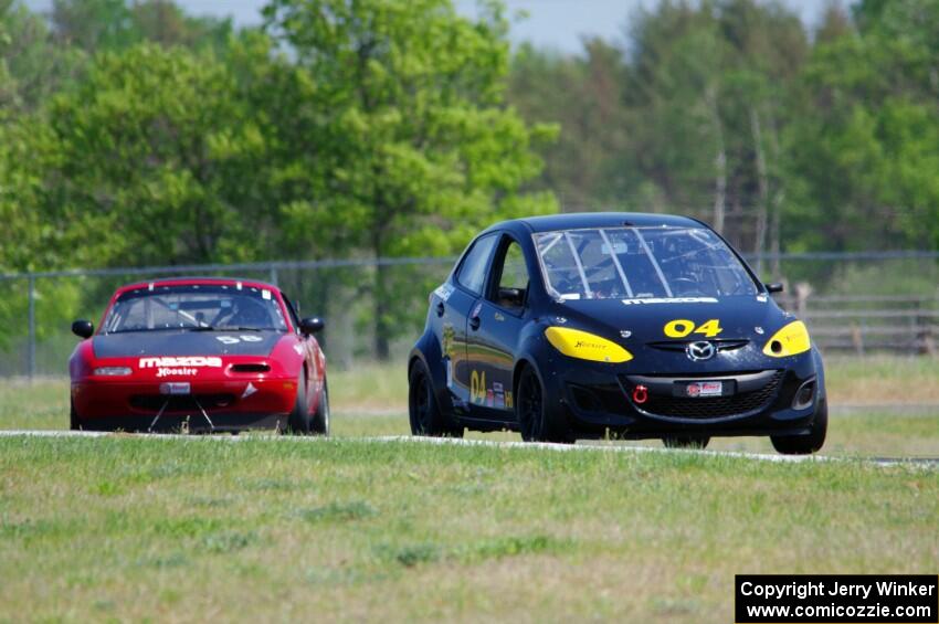 Mark Brakke's H Production Mazda 2 and Lon Blaser's STL Mazda Miata