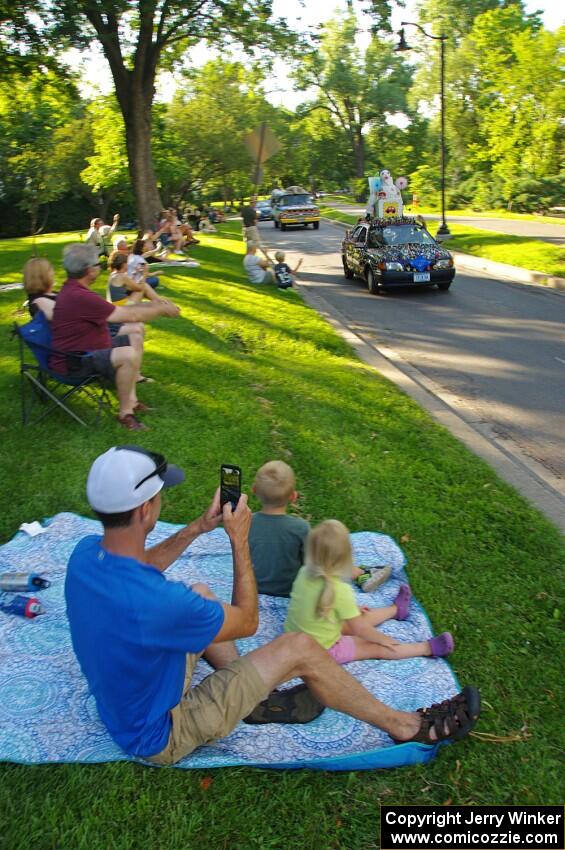 A family awaits ArtCar 19 - Toyota Corolla