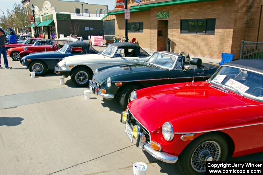 Three MGBs and an MG Midget