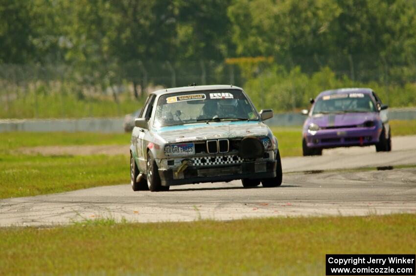 Chump Faces BMW 325is and Plum Crazy Plymouth Neon