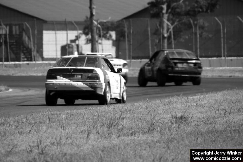 Dirty Side Down Racing BMW 325i chases rbankracing.com SAAB 9-3