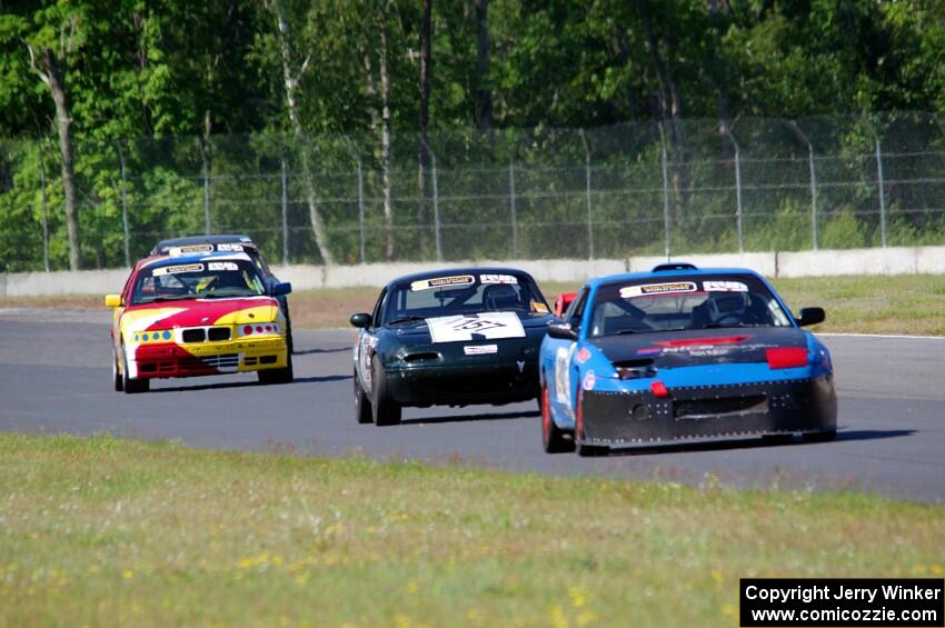 Sons of Irony Motorsports Nissan 240SX, Transcendental Racing Mazda Miata and Dirty Side Down Racing BMW 325i