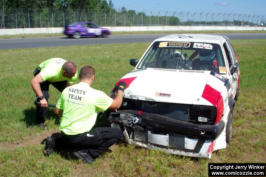 Virtually Worthless VW Golf had its day end after hitting the inside wall exiting turn 3.