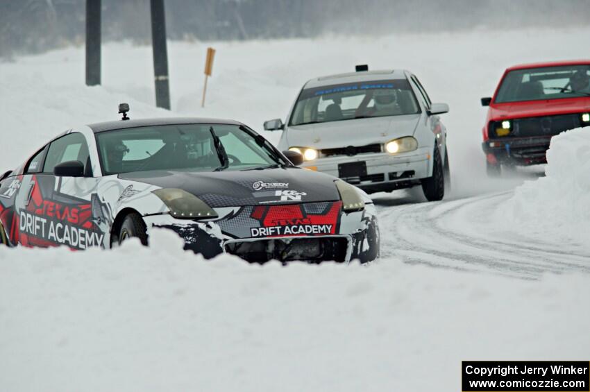 Josh Robinson's Nissan 350Z, John Kochevar's VW Golf and Mark Knepper's VW GTI