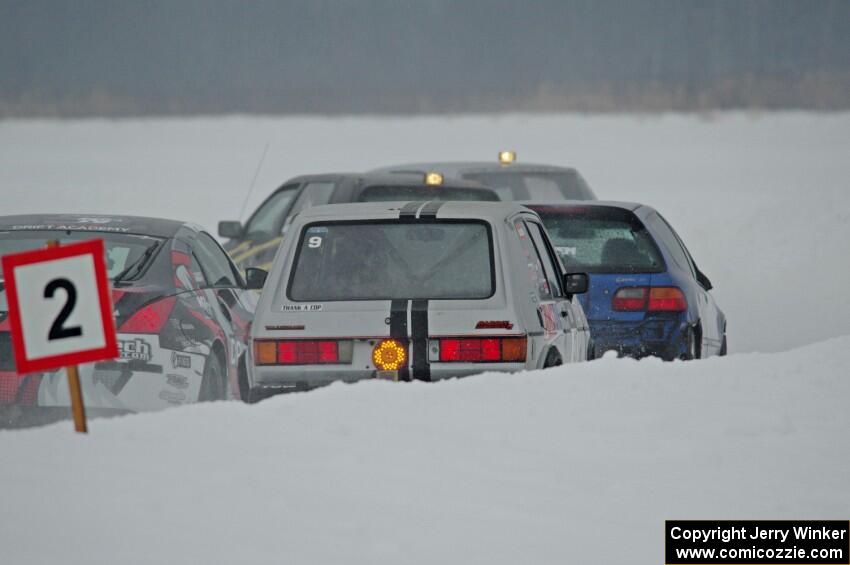 Josh Robinson's Nissan 350Z, Mark Utecht's Honda Civic and Matt Bjorge's VW Rabbit