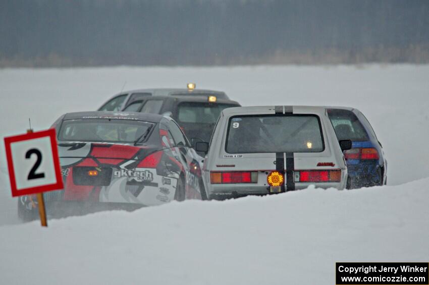 Josh Robinson's Nissan 350Z and Matt Bjorge's VW Rabbit make contact.