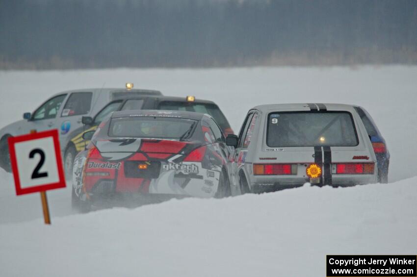 Josh Robinson's Nissan 350Z and Matt Bjorge's VW Rabbit make contact.