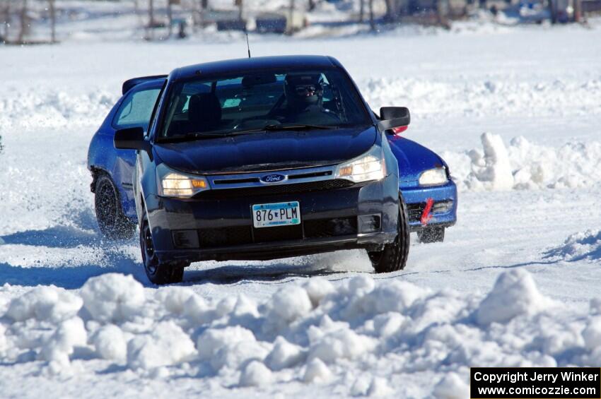 Russ Lupinek's Ford Focus and Frank Giegler / Mark Utecht Honda Civic