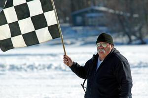 Bill Gibson works the flags.