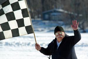 Bill Gibson works the flags.