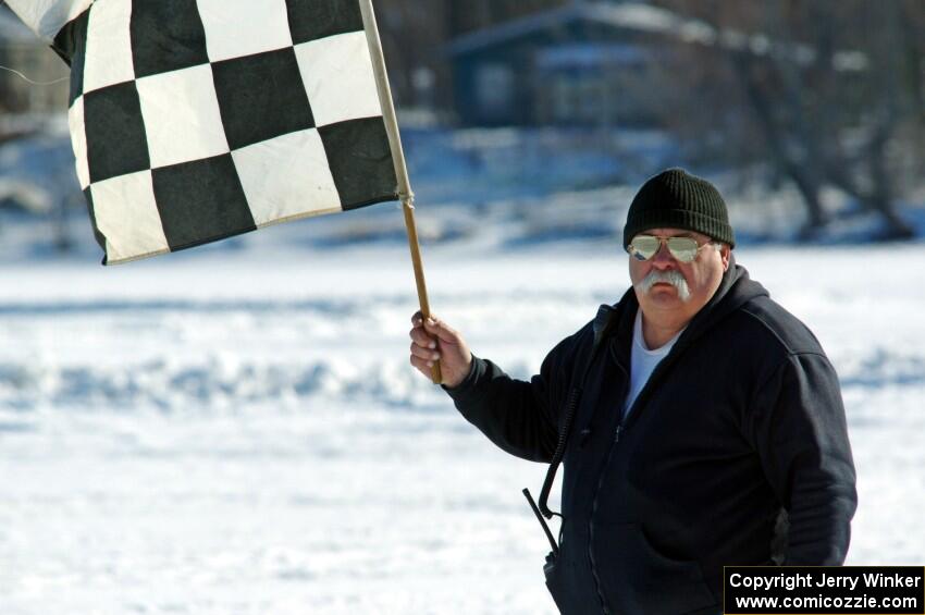 Bill Gibson works the flags.