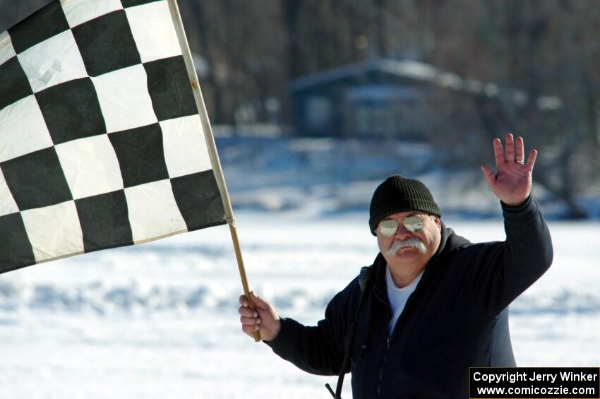 Bill Gibson works the flags.