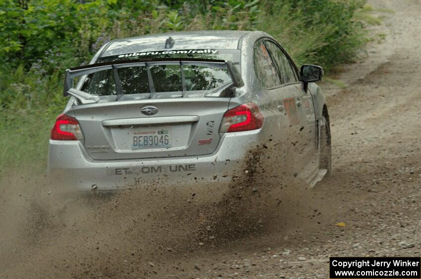 Travis Nease / Krista Skucas Subaru WRX STi at a sharp left on SS3, Steamboat I.