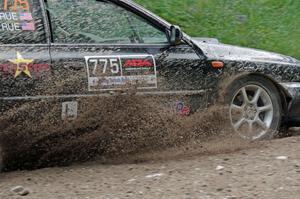 Kristian Rue / Mark Rue Subaru Impreza 2.5RS at a sharp left on SS3, Steamboat I.