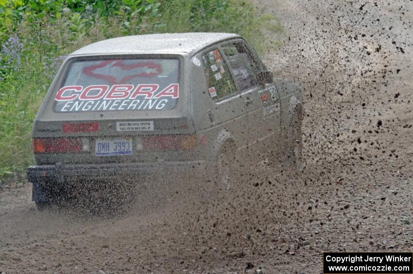 Adam VanDamme / Jake Carlson VW Rabbit at a sharp left on SS3, Steamboat I.