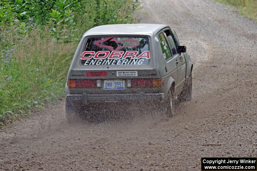 Adam VanDamme / Jake Carlson VW Rabbit at a sharp left on SS3, Steamboat I.