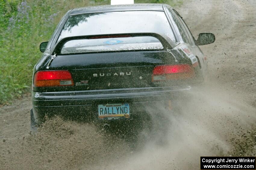 Kristian Rue / Mark Rue Subaru Impreza 2.5RS at a sharp left on SS3, Steamboat I.