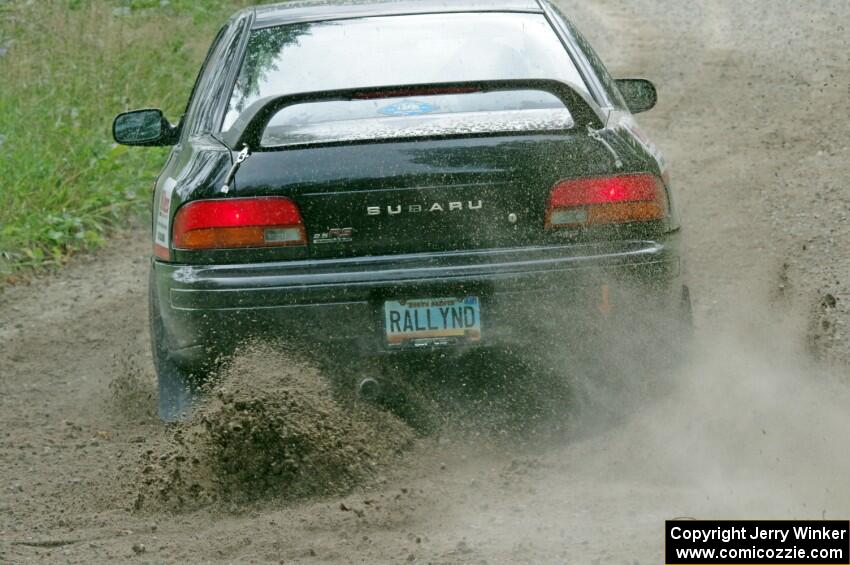 Kristian Rue / Mark Rue Subaru Impreza 2.5RS at a sharp left on SS3, Steamboat I.