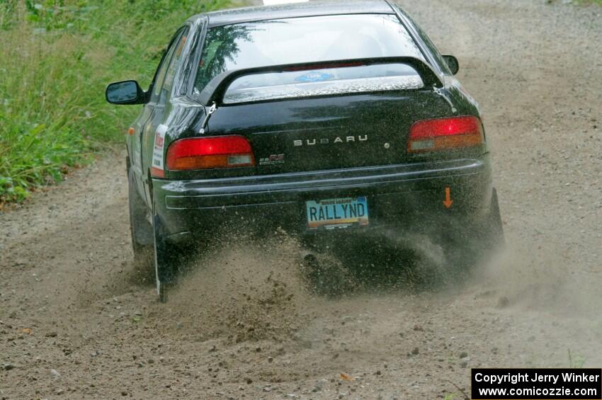 Kristian Rue / Mark Rue Subaru Impreza 2.5RS at a sharp left on SS3, Steamboat I.