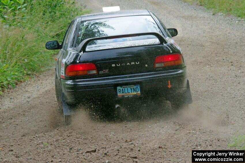 Kristian Rue / Mark Rue Subaru Impreza 2.5RS at a sharp left on SS3, Steamboat I.