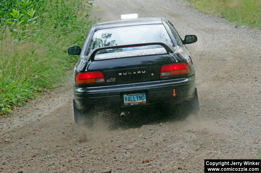 Kristian Rue / Mark Rue Subaru Impreza 2.5RS at a sharp left on SS3, Steamboat I.