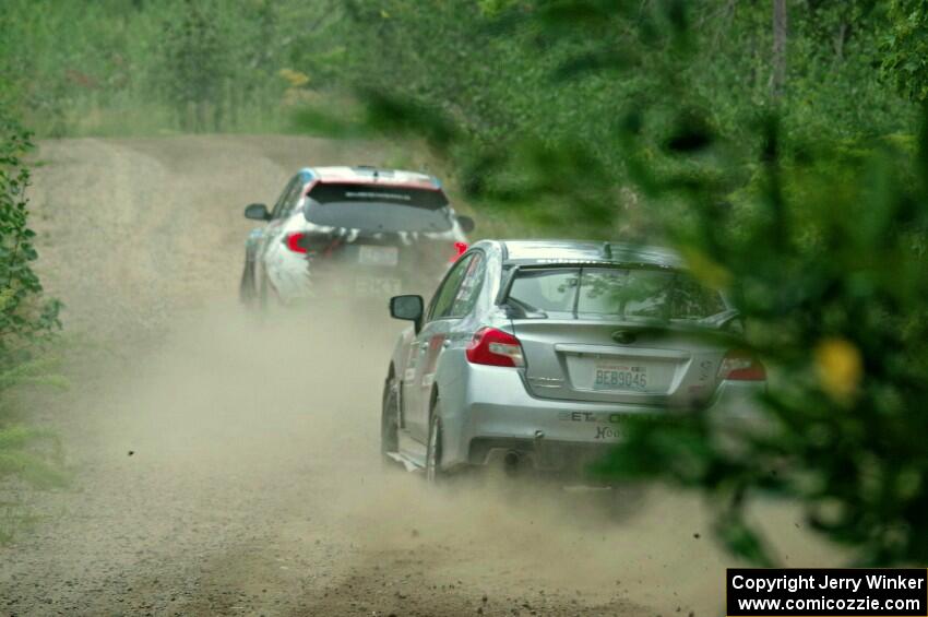 Travis Nease / Krista Skucas Subaru WRX STi chases Dennis Romero / Jose Maria Rodriguez Subaru WRX STi on SS6, Steamboat II.