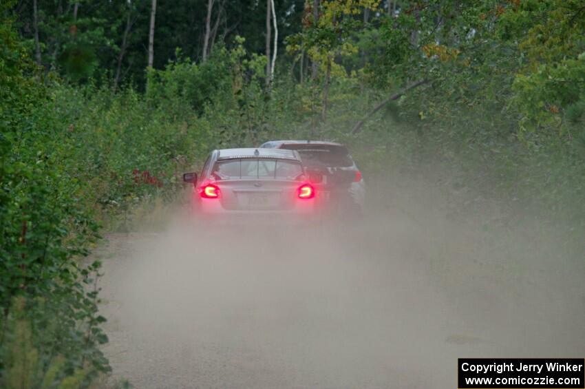 Travis Nease / Krista Skucas Subaru WRX STi chases Dennis Romero / Jose Maria Rodriguez Subaru WRX STi on SS6, Steamboat II.