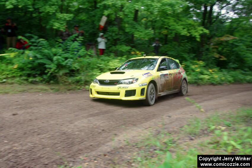 Lauchlin O'Sullivan / Scott Putnam Subaru WRX STi comes through the VIP spectator corner on SS8, Perkins Road.