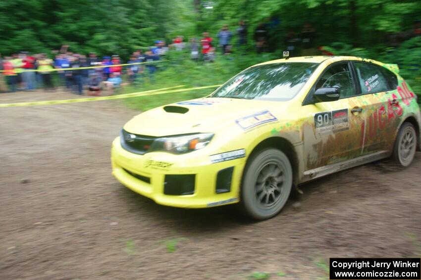 Lauchlin O'Sullivan / Scott Putnam Subaru WRX STi comes through the VIP spectator corner on SS8, Perkins Road.