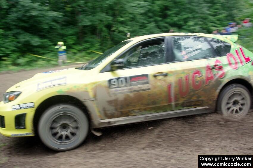 Lauchlin O'Sullivan / Scott Putnam Subaru WRX STi comes through the VIP spectator corner on SS8, Perkins Road.